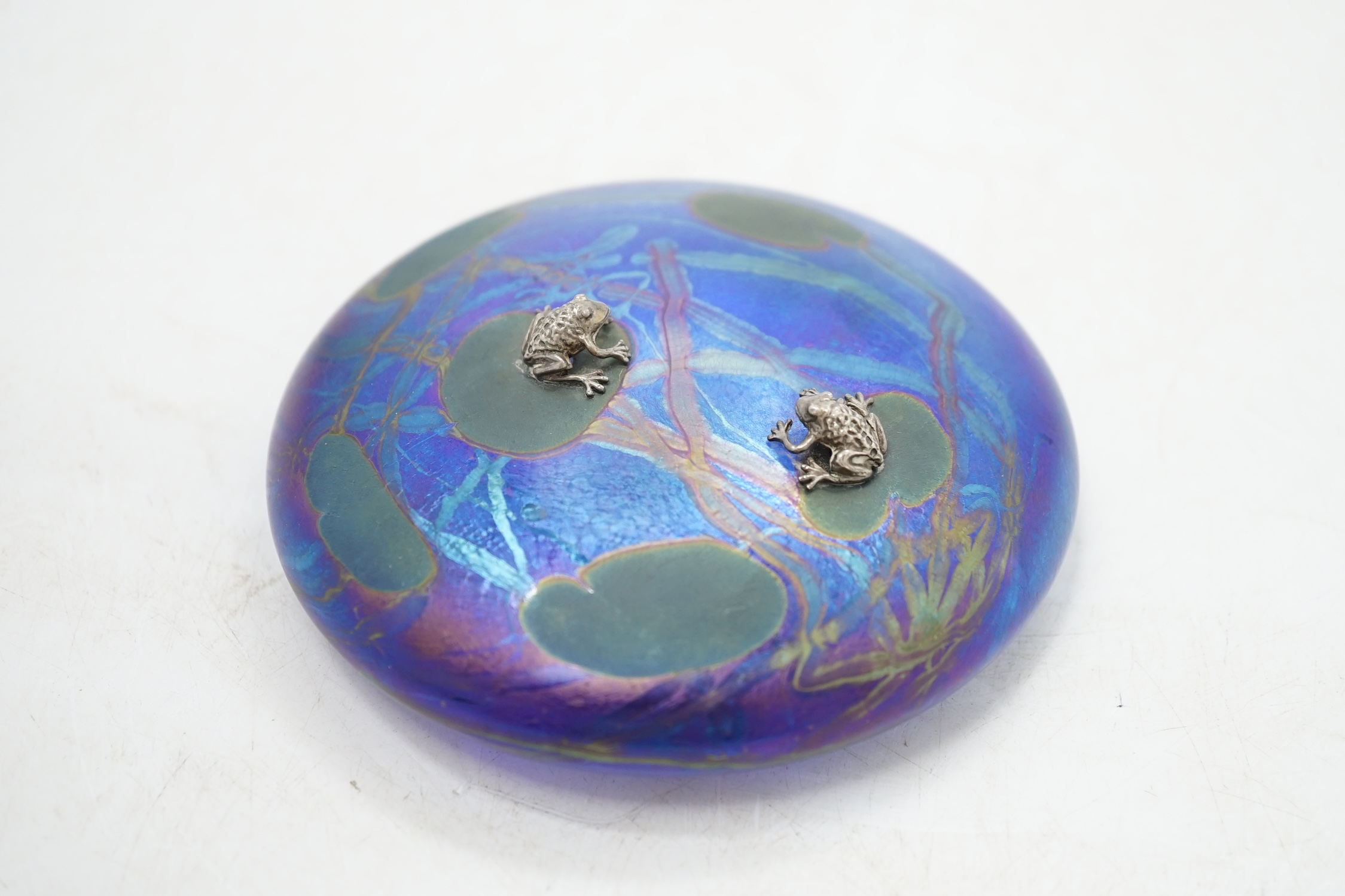 A John Ditchfield for Glasform disc shaped paperweight with mounted metal frogs on a lily pad, 10cm diameter. Condition - good